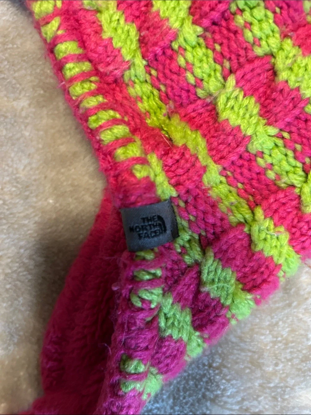 The North Face Pink and Lime Striped Pom-Pom Earflap Hat